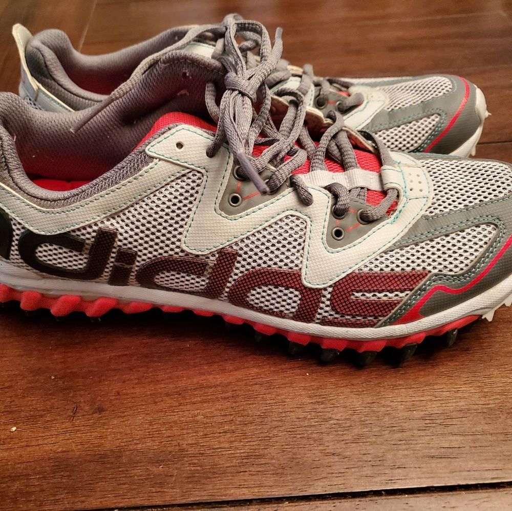 Gray Adidas athletic shoe with coral and turquoise